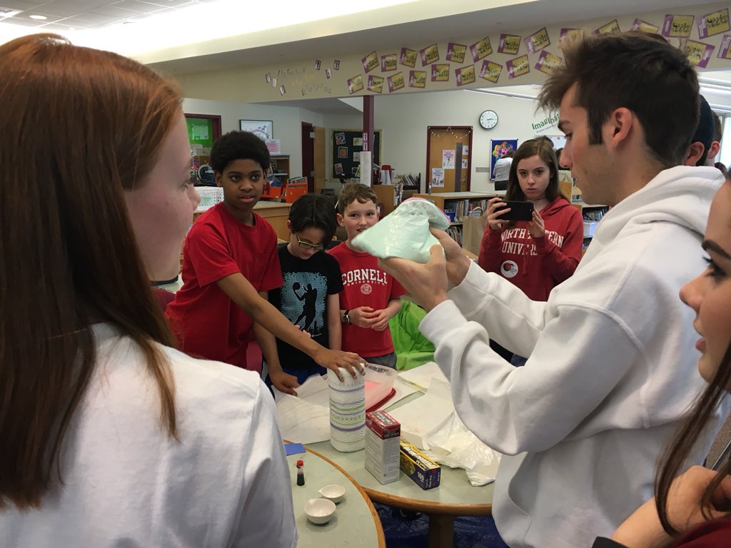 MsBookston's tweet photo. High school students teach 5th graders some chemistry @BundaChemistry @theNHSlibrary #fusema https://t.co/VYDd6duw73