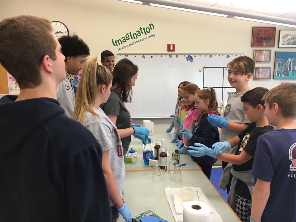 MsBookston's tweet photo. High school students teach 5th graders some chemistry @BundaChemistry @theNHSlibrary #fusema https://t.co/VYDd6duw73