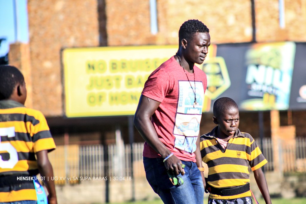henrynsek's tweet photo. "A candle loses nothing by lighting another candle." The master of the sidestep @WokorachPhilip showing the little ones how it's done. 👏👌 #TagRugby #UgRugby #HensekShot https://t.co/1I9nH5XsXi