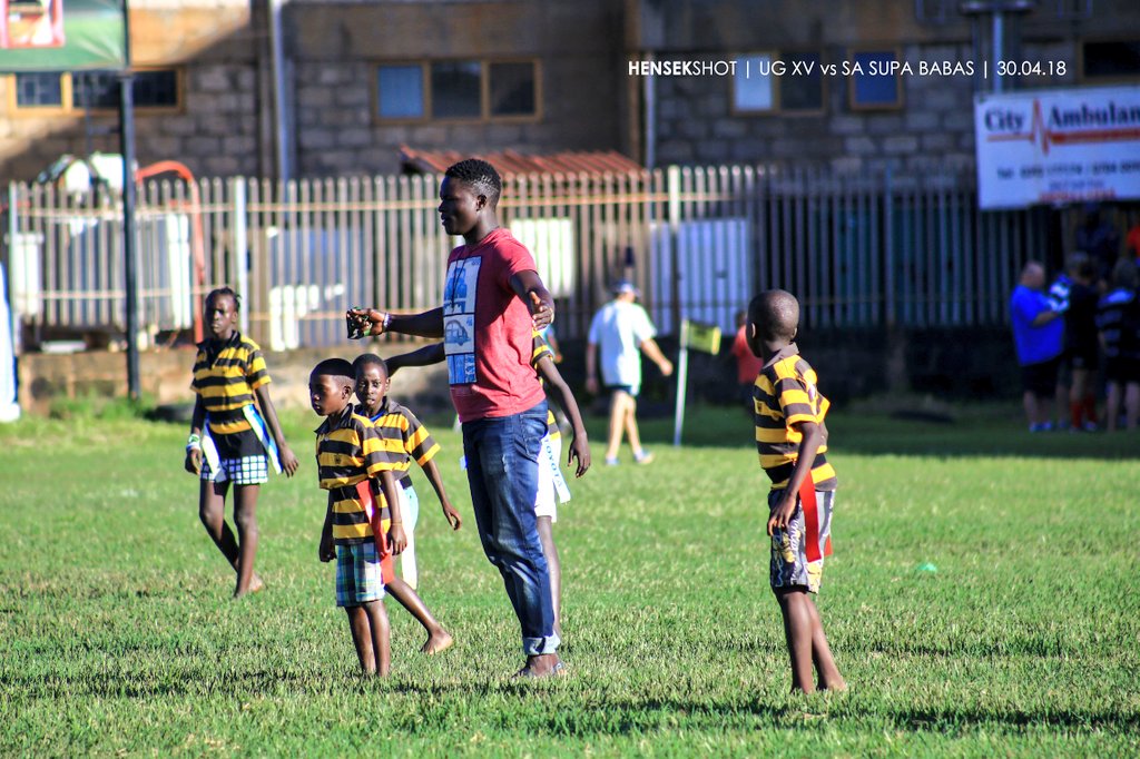 henrynsek's tweet photo. "A candle loses nothing by lighting another candle." The master of the sidestep @WokorachPhilip showing the little ones how it's done. 👏👌 #TagRugby #UgRugby #HensekShot https://t.co/1I9nH5XsXi