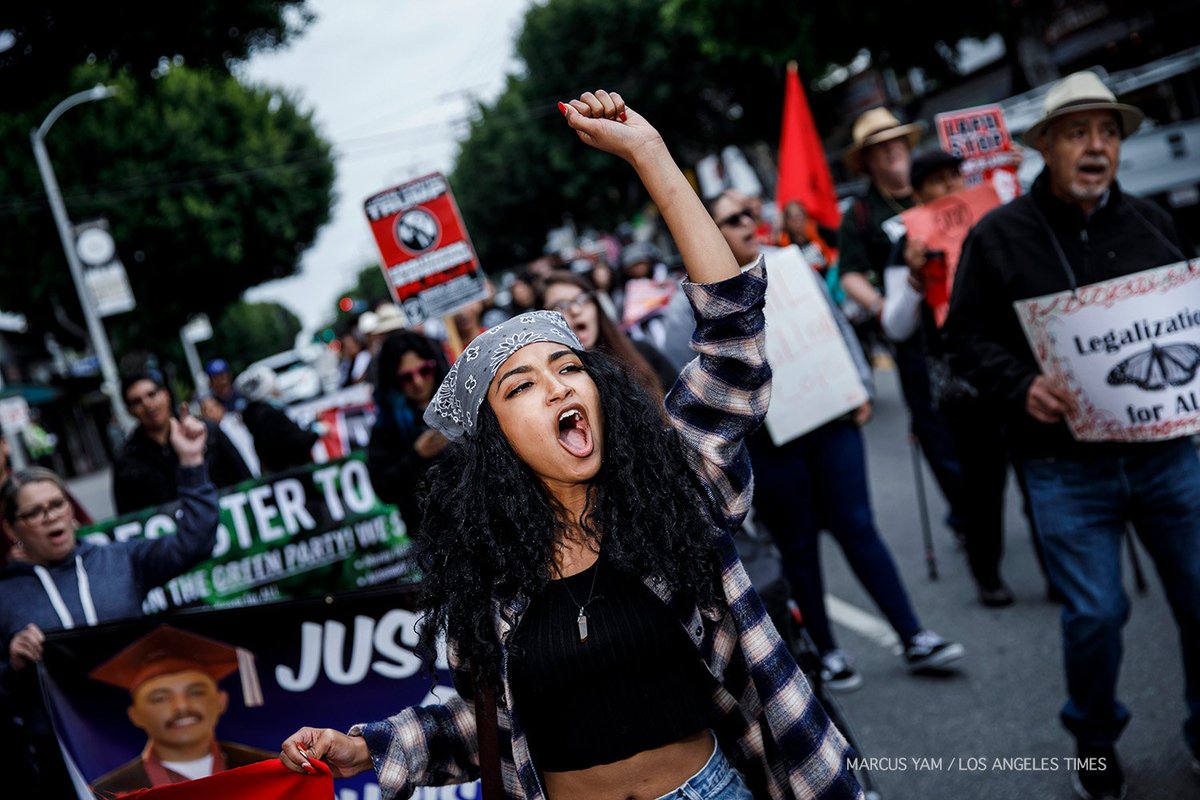 yamphoto's tweet photo. Our #MayDayLA story: May Day Protesters march through downtown L.A. amid gloomy skies and drizzle. https://t.co/RKmsjFkYfC https://t.co/y9tUDm2wq0