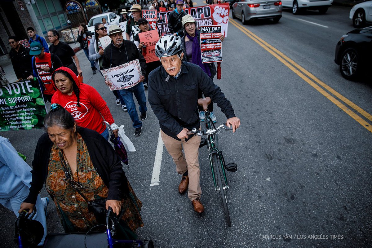 yamphoto's tweet photo. Our #MayDayLA story: May Day Protesters march through downtown L.A. amid gloomy skies and drizzle. https://t.co/RKmsjFkYfC https://t.co/y9tUDm2wq0