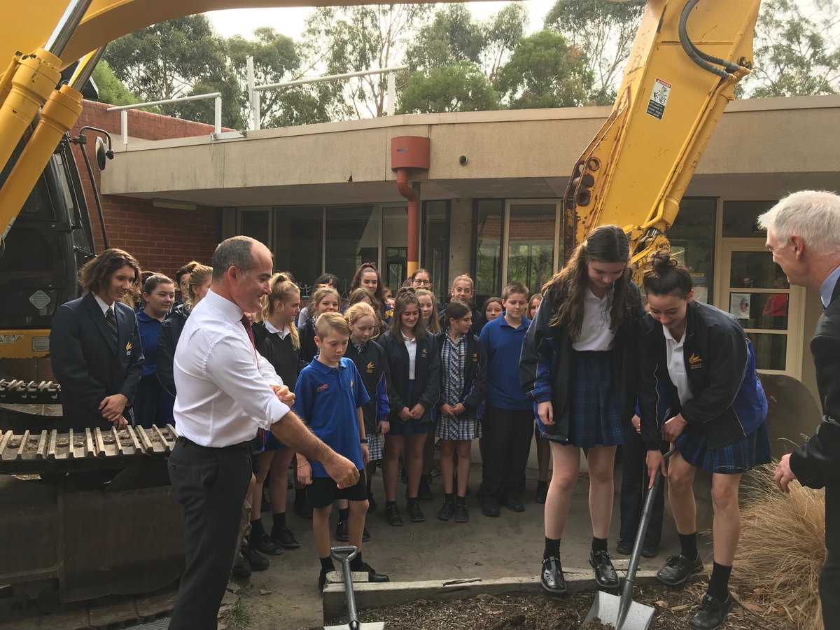 Minister for Education and local member James Merlino with SRC Co Presidents, Meagan and Wren turning the first sod in the UHS $23.9 million redevelopment