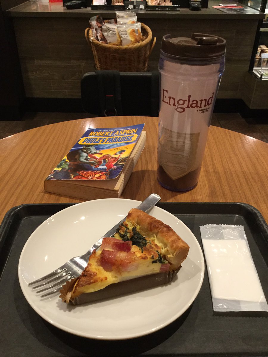 RickyInJapan's tweet photo. Enjoying a quiet moment in Starbucks. Good book, good coffee, tasty quiche. My moms quiche is way better though. @Starbucks_J #RobertAsprin #phules https://t.co/DYtlsORPJv