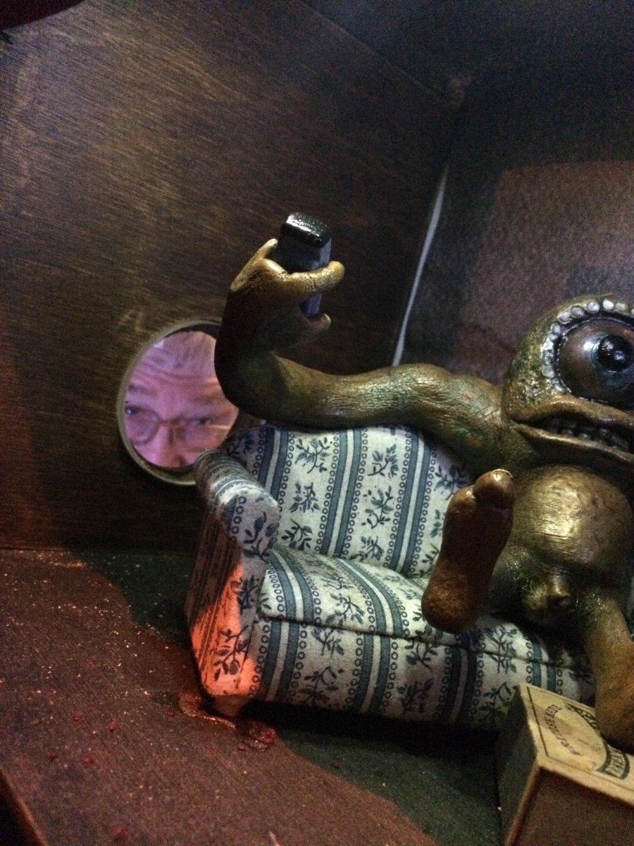 StrangerWorlds2's tweet photo. A casual observer gazes closely into one of the ‘Stranger Worlds’.  Challenged by what he sees the question is…What happens next? This is exactly one of the reactions the artist was posing and has given him an idea…#BEAF2018 @bmthfringe https://t.co/CNqyYB9hxx
