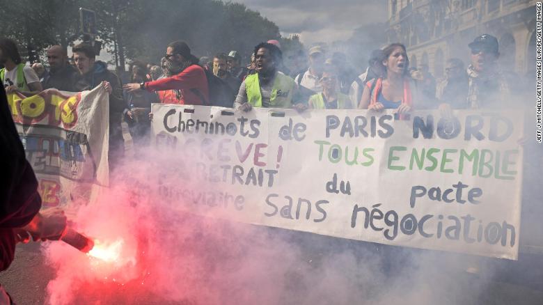 cnni's tweet photo. More than 100 people remained in custody in Paris on Wednesday after annual May Day protests turned violent, police said. https://t.co/cxCYY6OnMc https://t.co/WNOxAAmmr5