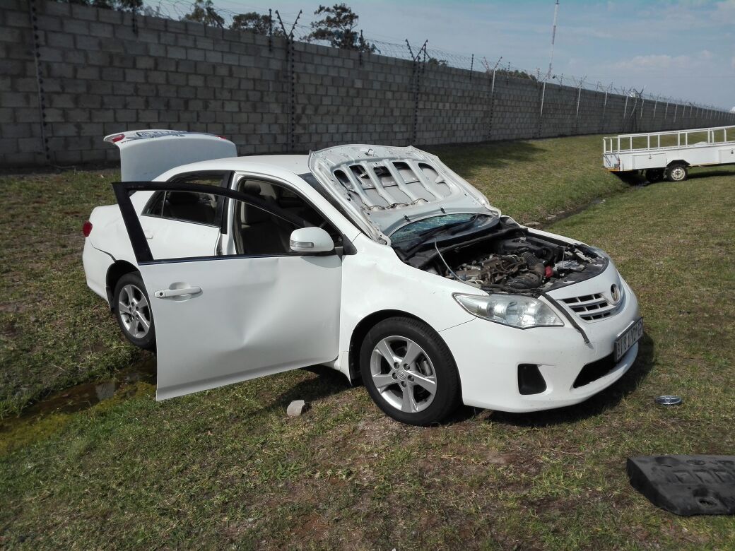 HeraldNMB's tweet photo. #PEprotest - Further damage reported in Greenbushes area following protest action. A wall has been broken down at JD Supply Chain Services, a vehicle has been damaged and stock stolen from the warehouse. https://t.co/rFKaIcPCLw
