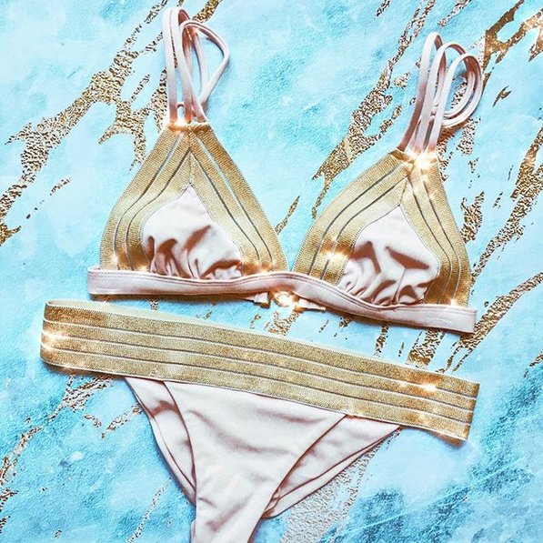 HoneysLingerie's tweet photo. One range two stunning colours, which Beach Bunny bikini is your favourite? Classic black and gold or pretty nude and gold. https://t.co/RMTTdpT7qO