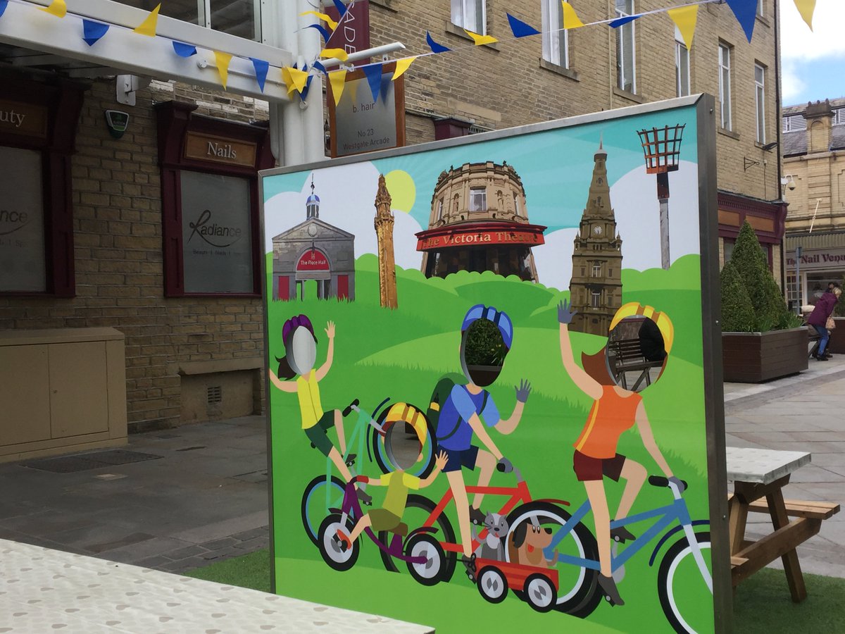Calderdale's tweet photo. Halifax is getting ready for the #TourdeYorkshire and looking fab in the sunshine! The final day of the race will start @ThePieceHall on Sun 6 May. Find out more on the @VisitCalderdale blog https://t.co/SfJvQMEsMS #activecdale @letouryorkshire https://t.co/fv50K5ya1Z