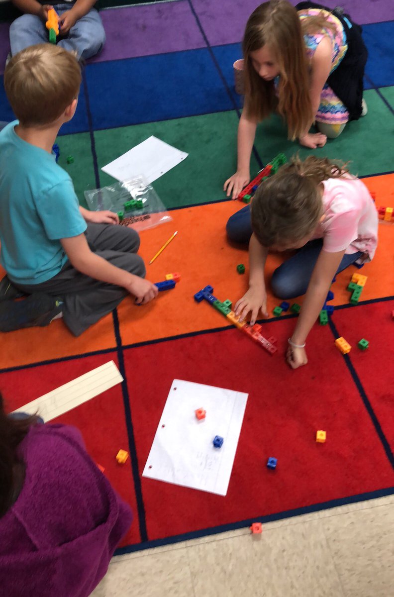 Building trains and measuring with paper clips!@Buda_Bulldogs