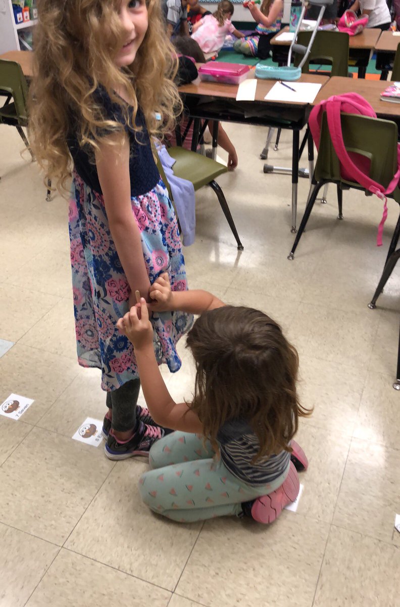 Measuring friends with popsicle sticks!@Buda_Bulldogs