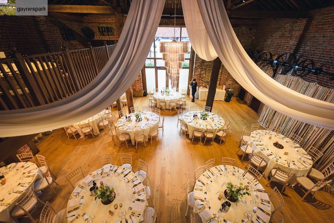 #Repost from @gaynespark with @regram.app 
 ... 

THE MILL BARN. ROUND TOP TABLE. Image by @justinbaileyphotography. Styling of half draping to see the four trunks, ribbon backdrop and lighting by @venuestylist #gaynespark #barnwedding #wedding #weddingvenue #essex #style