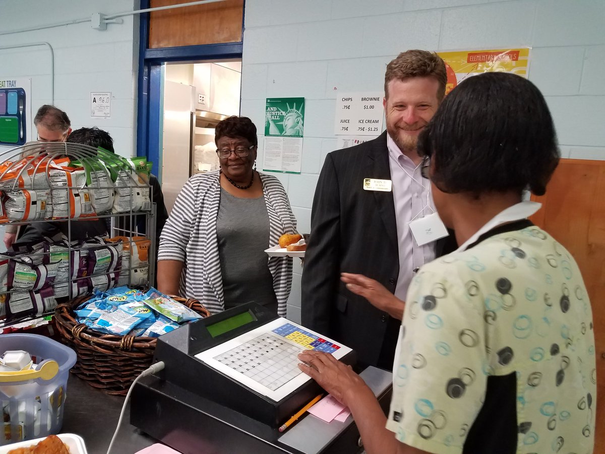 WCPSS's tweet photo. After touring Fuller Magnet Elem. with other elected officials, @RepDavidEPrice presented the school with a flag flown over the US Capitol. @FullerMagnetAP #FullerElementary #FullerPTA #ElectedOfficialsVisit2018 #WhatStartsHereChangesEverything https://t.co/MjqOo7Oq6l
