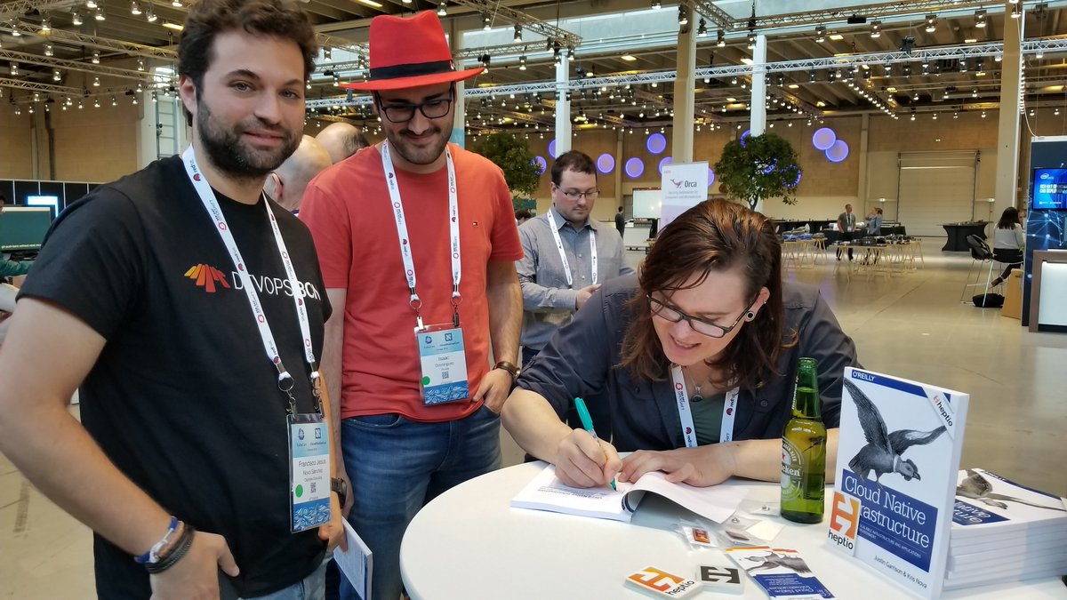 heptio's tweet image. Book signing with @krisnova NOW! #cloudnativeinfrastructure #kubecon.