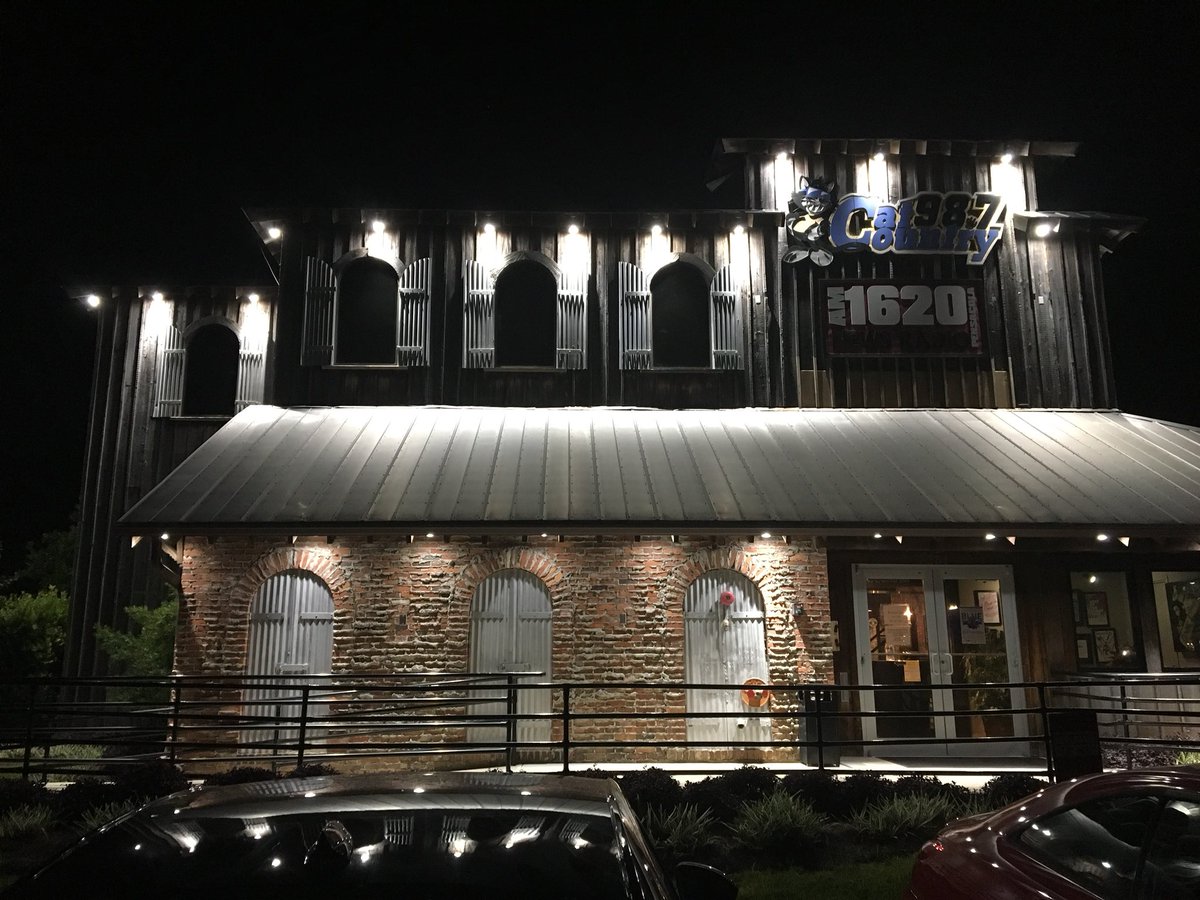 AjitPai's tweet photo. Cool late-night visit to Pensacola, Florida’s @NR1620 (which also kindly had me on-air this morning) and @catcountry987, @CountryMusic’s Radio Station of the Year for 2017! Nice to hear and see how the stations are keeping Floridians entertained and informed. #WNRP #WYCT https://t.co/RGjNzXotO6