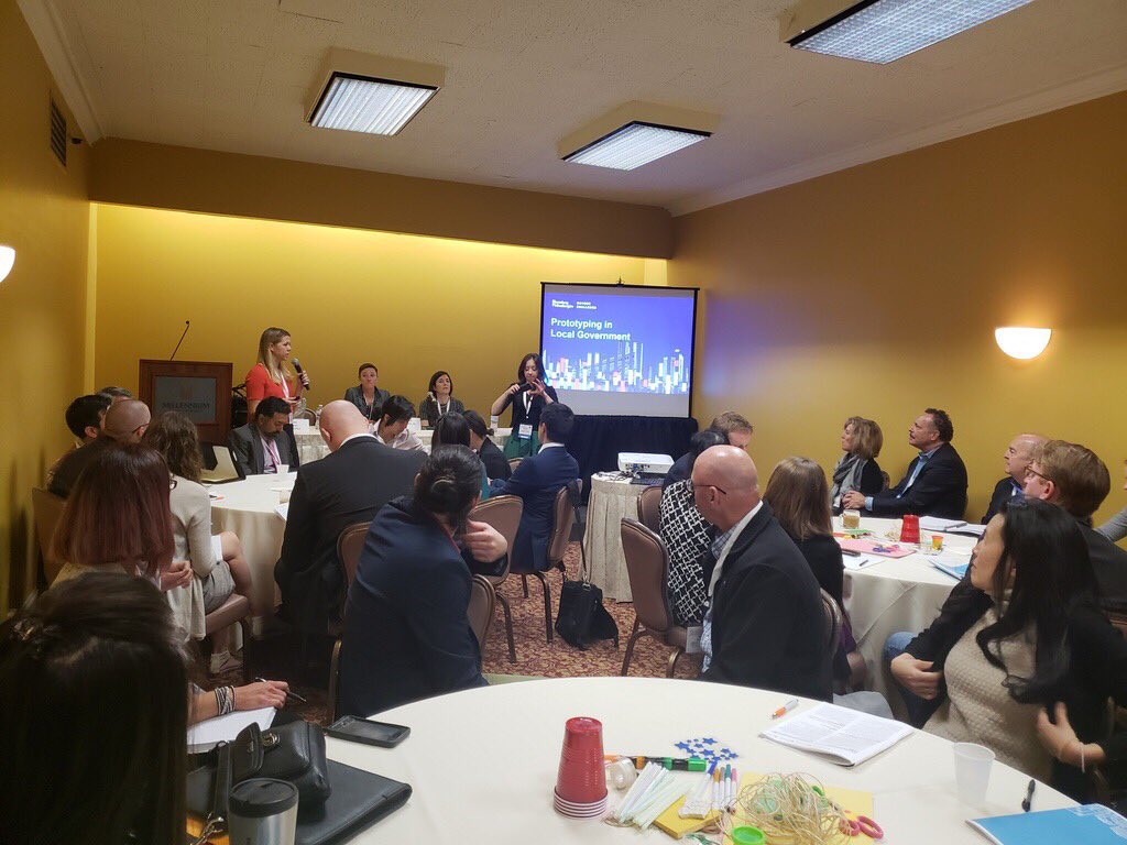 govex_jhu's tweet photo. It’s a packed room for @BloombergCities on prototyping new ideas in local government #AccelerateThis. Definitely the only session with play dough! https://t.co/SS91dCZMk2