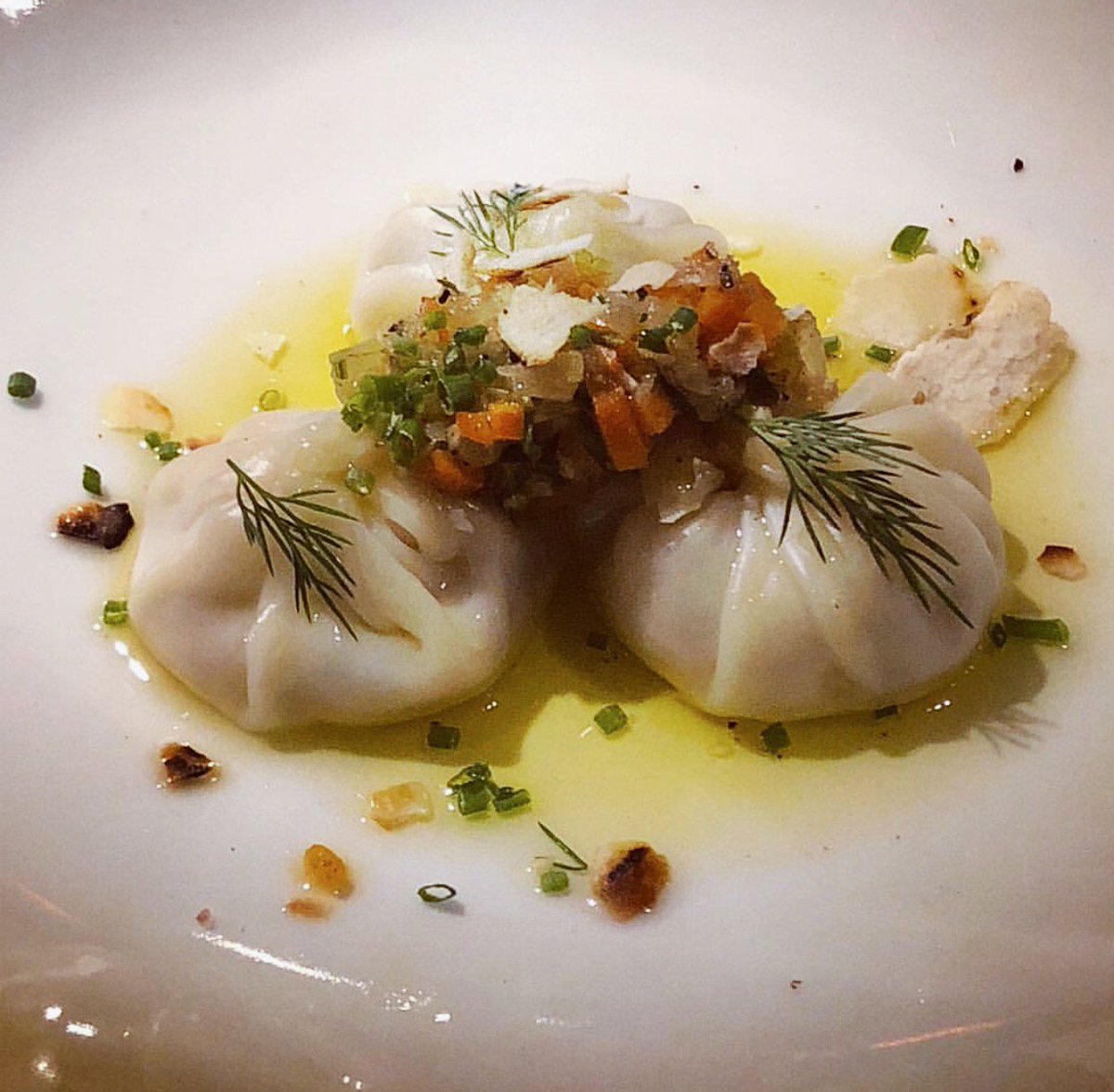 Ready for their close up. MATZAH BALL SOUP DUMPLING / Mirepoix, Chicken Boullion, Schmaltz, Lemon Olive Oil, Dill.