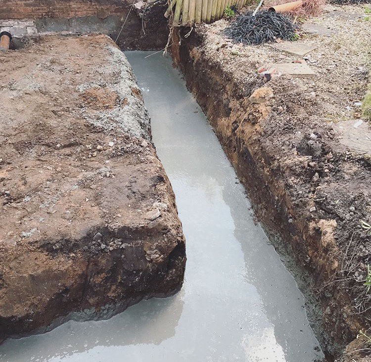 TrArchitectural's tweet photo. All poured up and ready for block and brickwork up to damp! #trarchitecturalservices #DPC #groundworks #concrete #pour #wheelbarrow #service #construction #deisgnandbuild #drainage #wilmslow #glensidedrive https://t.co/E8ZybIjIbN