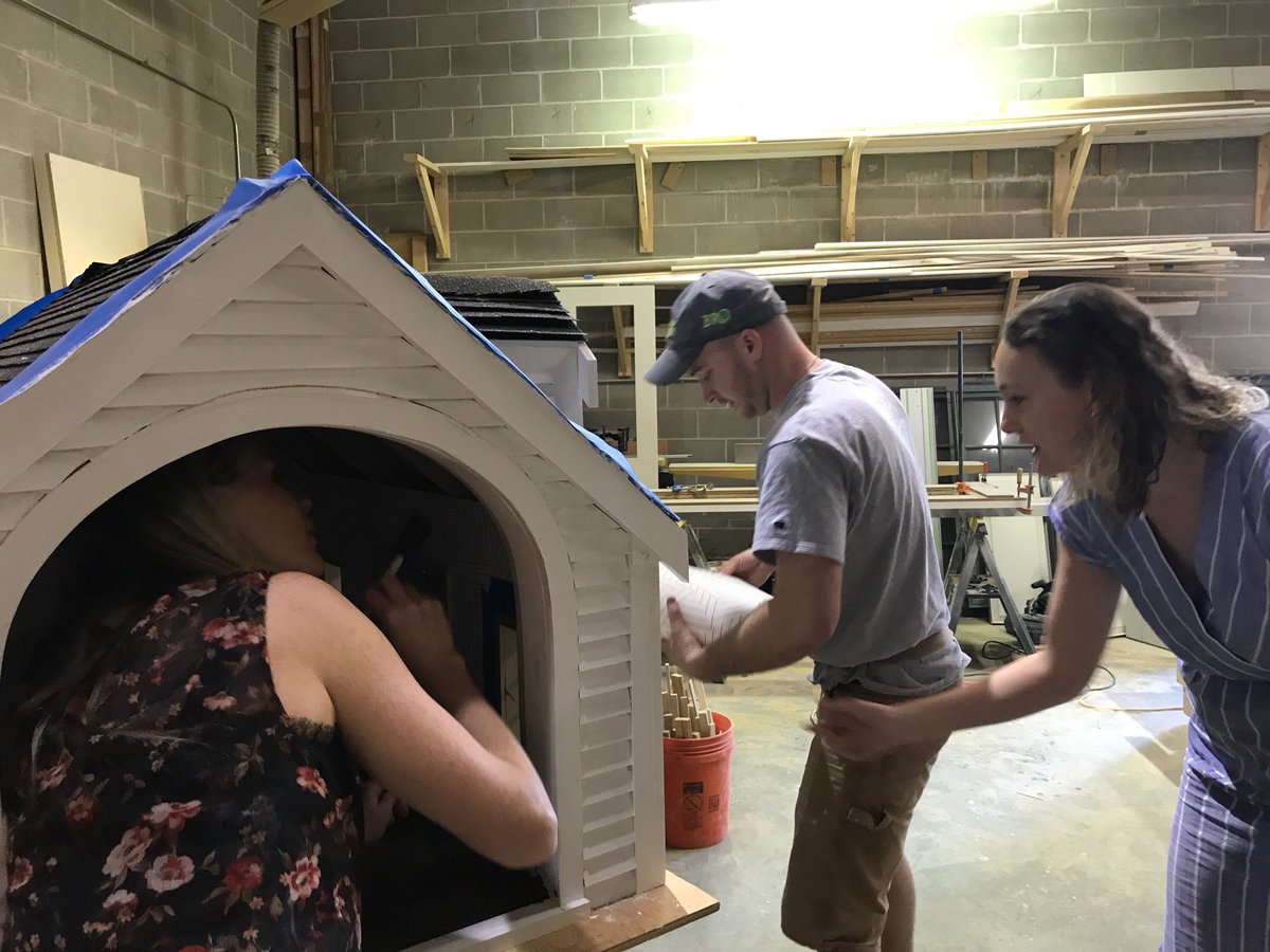 RoomscapesInc's tweet photo. Designers Lisa and Kelley and lead carpenter Wes working on the finishing details of our custom dog dream bed 🐾🐾#customdoghouse #BowWowBlitz @BostonDesignCtr Gala and Auction May 9th! https://t.co/uWgYebCwtG