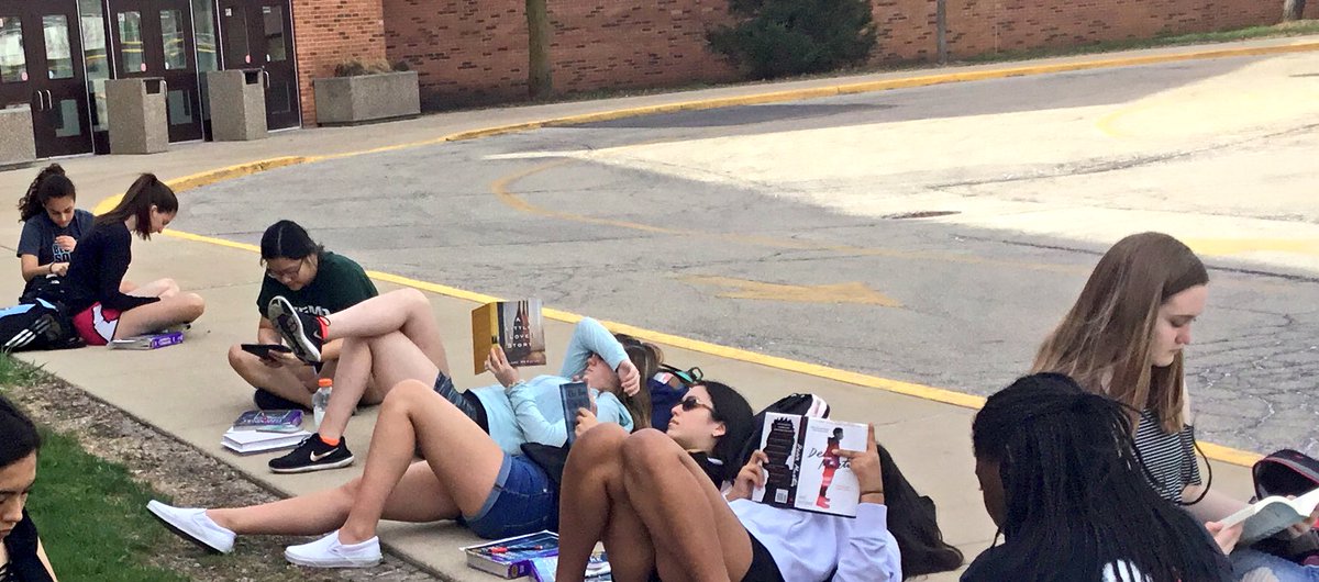 SabraGerber's tweet image. Freshmen enjoying one of life’s great pleasures: reading outside on a beautiful day. Hope many of their summer days include moments (hours!) like this. #independentreading #highschoolreaders #booklove #summerreading  @FremdEnglish @ThisIsFHS @ProjectLITComm @getnicced