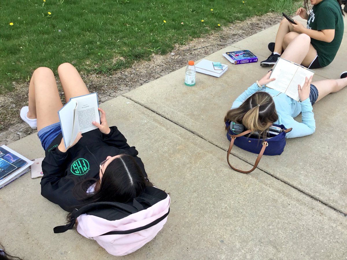 SabraGerber's tweet image. Freshmen enjoying one of life’s great pleasures: reading outside on a beautiful day. Hope many of their summer days include moments (hours!) like this. #independentreading #highschoolreaders #booklove #summerreading  @FremdEnglish @ThisIsFHS @ProjectLITComm @getnicced