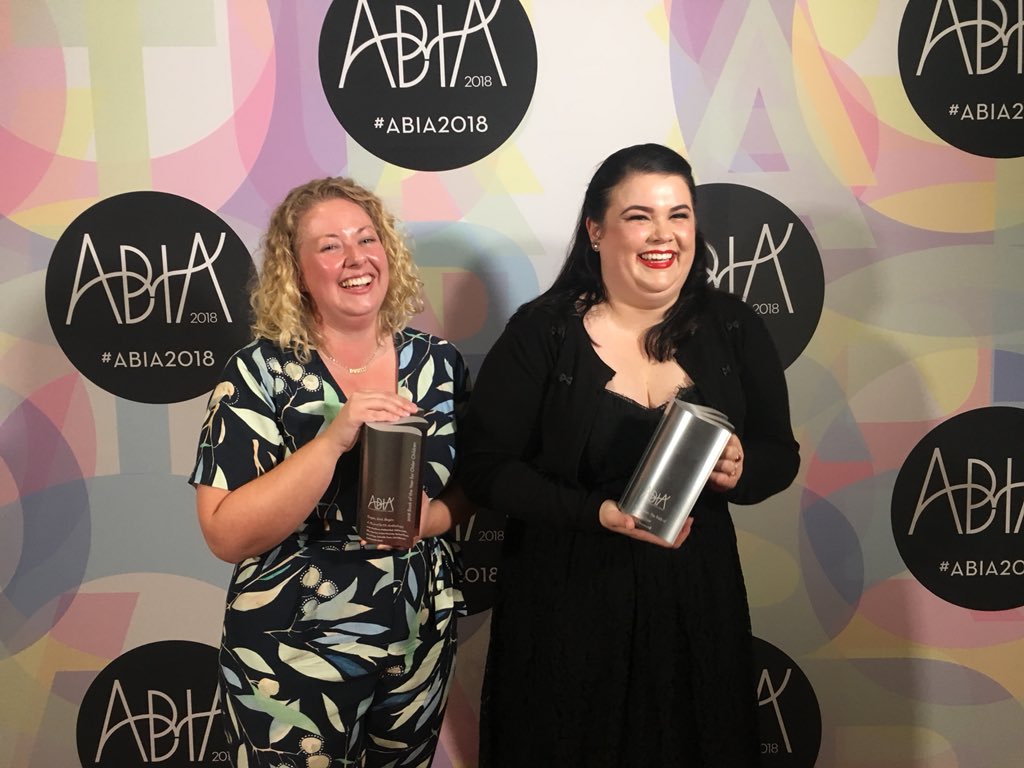 booktopia's tweet photo. Look at these two amazing ladies! @danielle_binks and @digressica with their shiny new awards π #ABIA2018 #LoveOzYA #nevermoor #BeginEndBegin #stepboldly https://t.co/kyg66jSMiC
