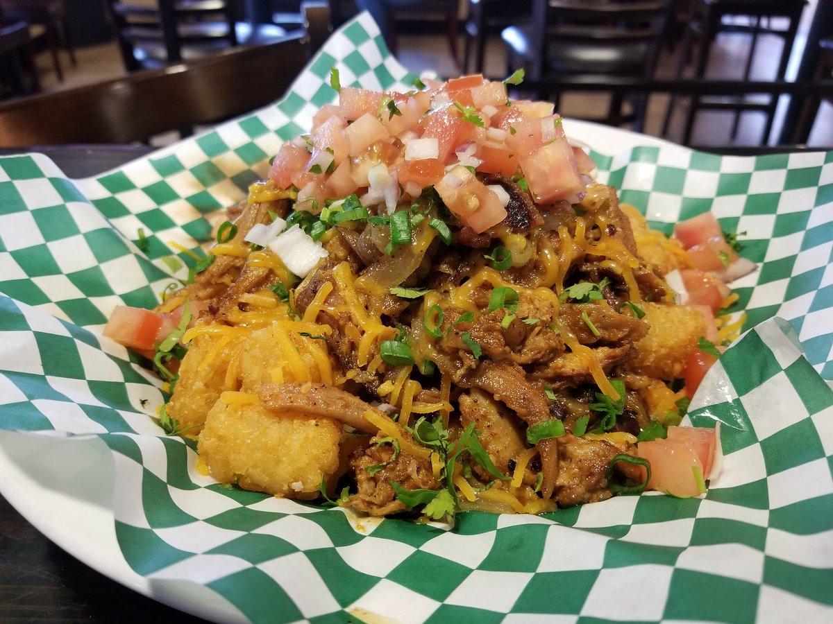 Tachos!! Yup, they're on our secret menu. But if I put it on tweeter, is it still a secret??  Pulled pork, bacon, cheese, grilled onion, tots.