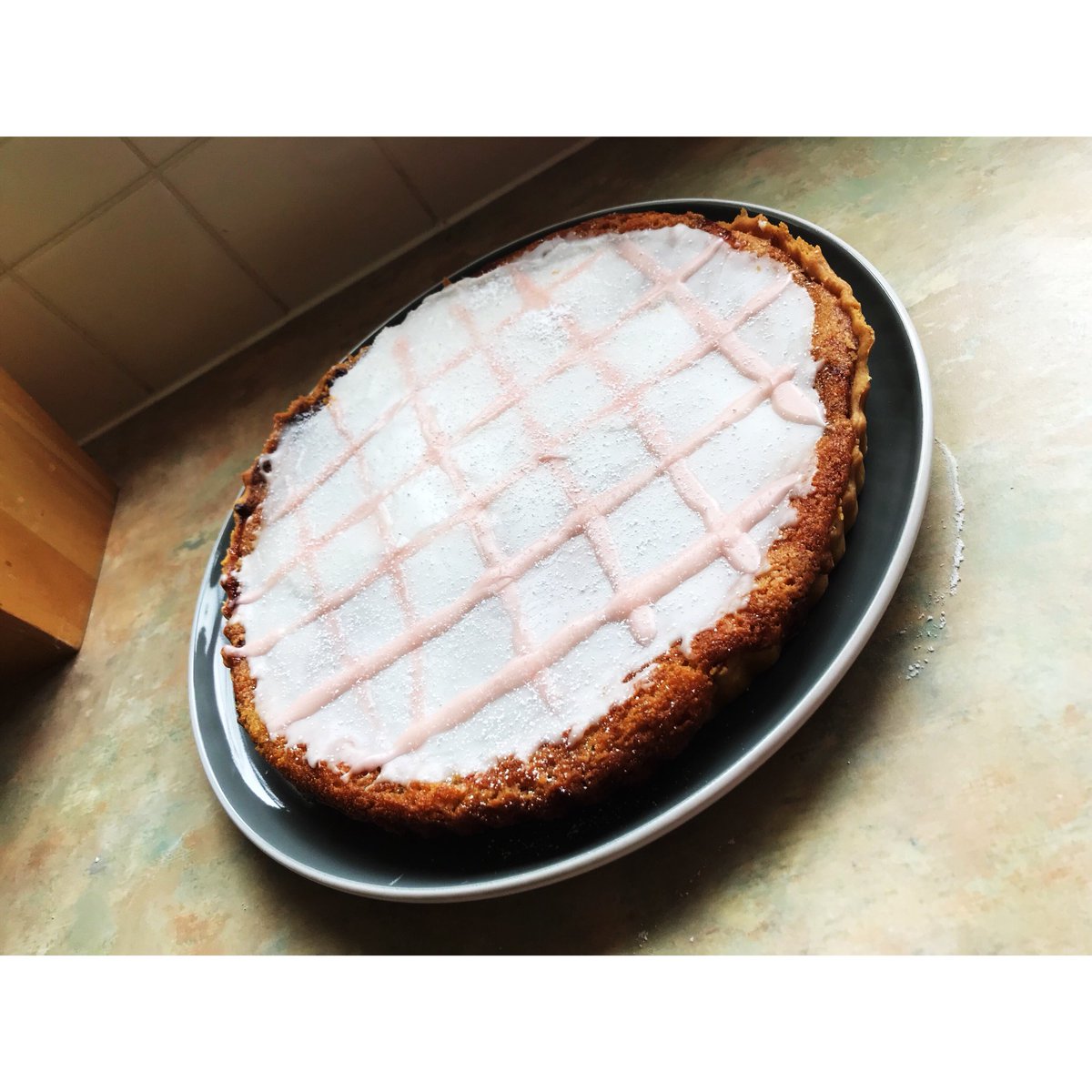 Loishumphreys's tweet photo. Homemade Bakewell tart #bakewell #tart #icing #pastry #crisscrosspattern #pink #rasberryjam #homemade #baking #firstattempt #2018 https://t.co/YKPOqqXA3V