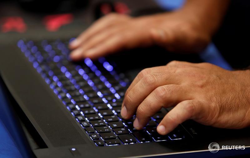 Reuters's tweet photo. Crime fighters of the digital age are in short supply https://t.co/J3M7HW19Yu Find out more about the #WorldAtWork https://t.co/vdOcc7ACvA https://t.co/R5scxHqk8p