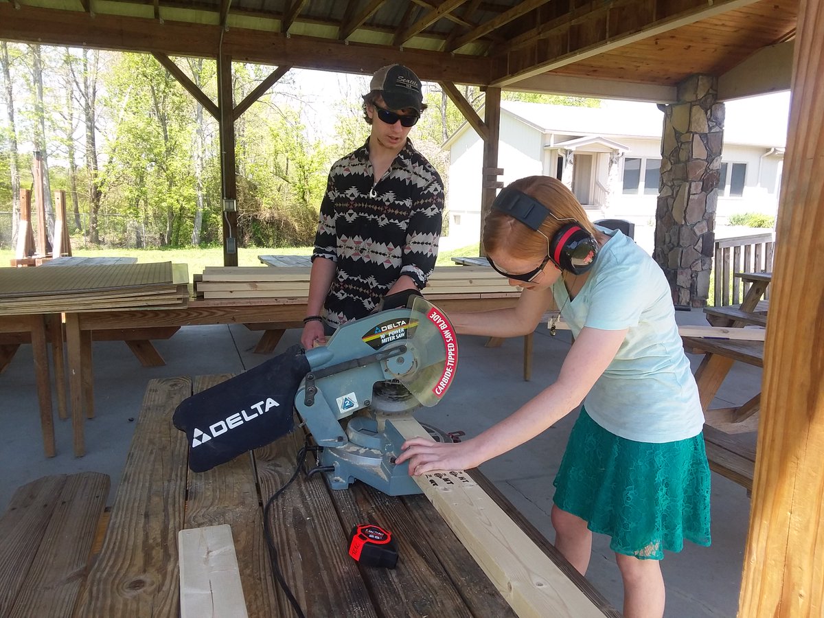 adamhaigler's tweet image. Students @TCECHS working on a #PBL project called Makespace, where they are building furniture for our new #makerspace learn how to use a chop saw. Earlier in the day, students in my media makers class videoconferenced with @ForYourParty VP of biz development. #opensourcelearning