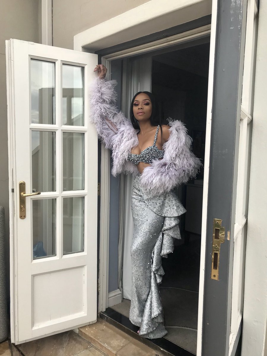 Bonang's tweet photo. ....playing dress up... 👑💰 https://t.co/FpjkA18tky