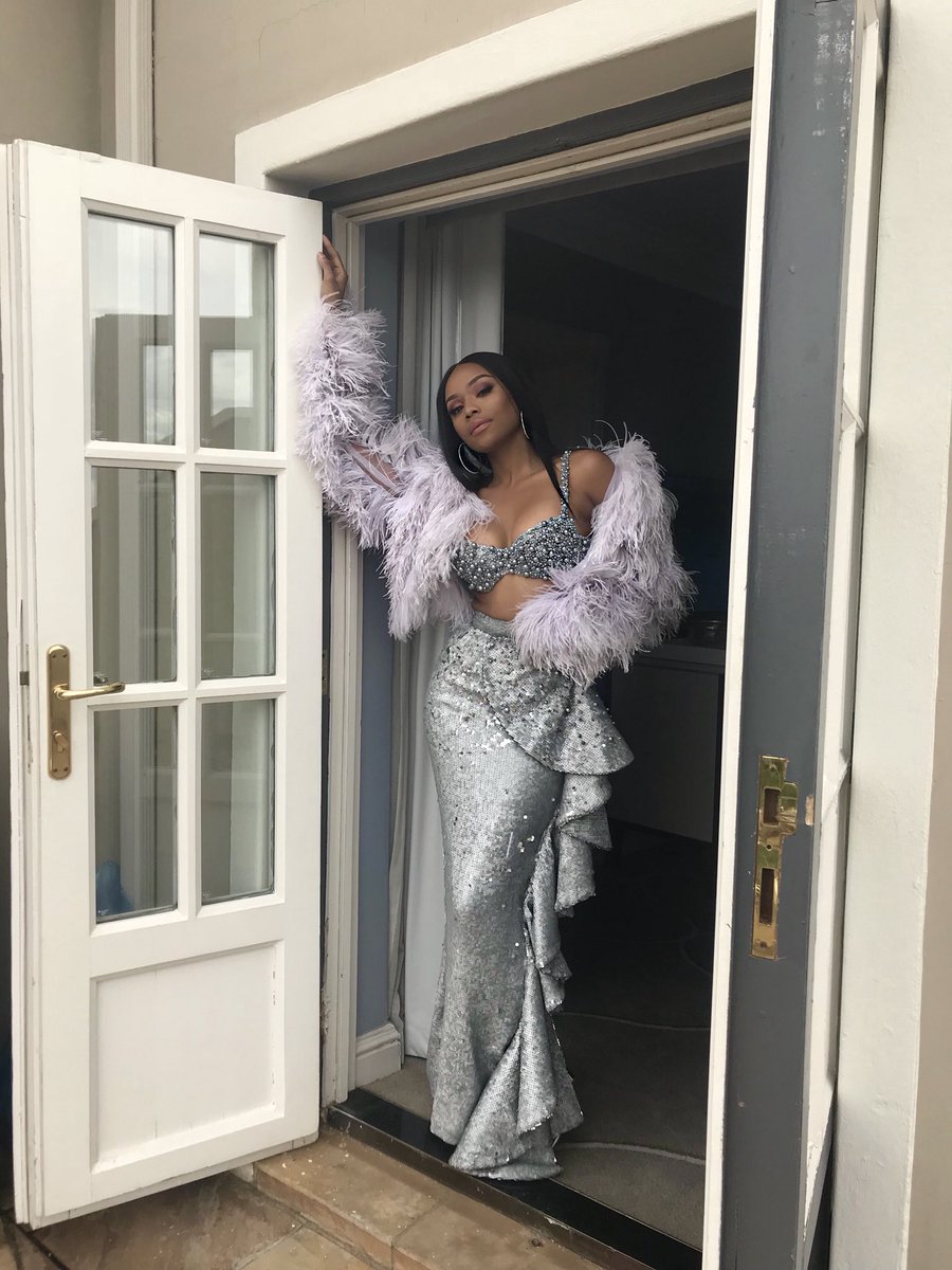 Bonang's tweet photo. ....playing dress up... 👑💰 https://t.co/FpjkA18tky