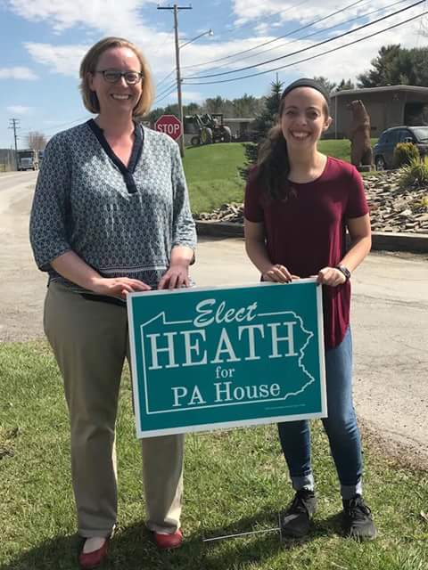 carrieforpa68th's tweet photo. "Planted” our first yard sign yesterday in front of Titan Sports and Graphics. Sydney is one of the students who inspired me to run and push for a career and technical center school. She registered to vote for the first time in order to vote in this election! https://t.co/nBdexbF2D7