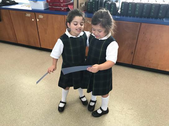 Cutest #kindergarten kids supporting each other (with their arms around each other!) while reviewing content by engaging in the @KaganOnline structure Quiz-Quiz-Trade in Bermuda!