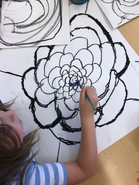 K Ss yesterday learned about stained glass and visual texture to help inspire some large scale flower drawings! I love all of them already! #lovemyjob #greatplacetoworkandlearn <a href="/m3ga7r0n/">Maegan Exline</a>
