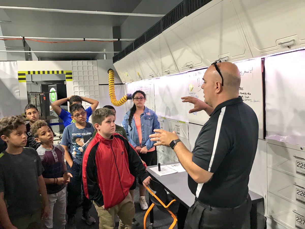 ocpsotc's tweet photo. Launch Site program chair Alan Lynch of @otcmidflorida gives Castle Creek Elementary students a first-hand look at the Mars #STEMExperience on campus! Shaping young minds - itโs a wonderful thing! ๐ซโจ #ForStudentsNotProfit #CareerTechEd https://t.co/yQJzSWNCQl