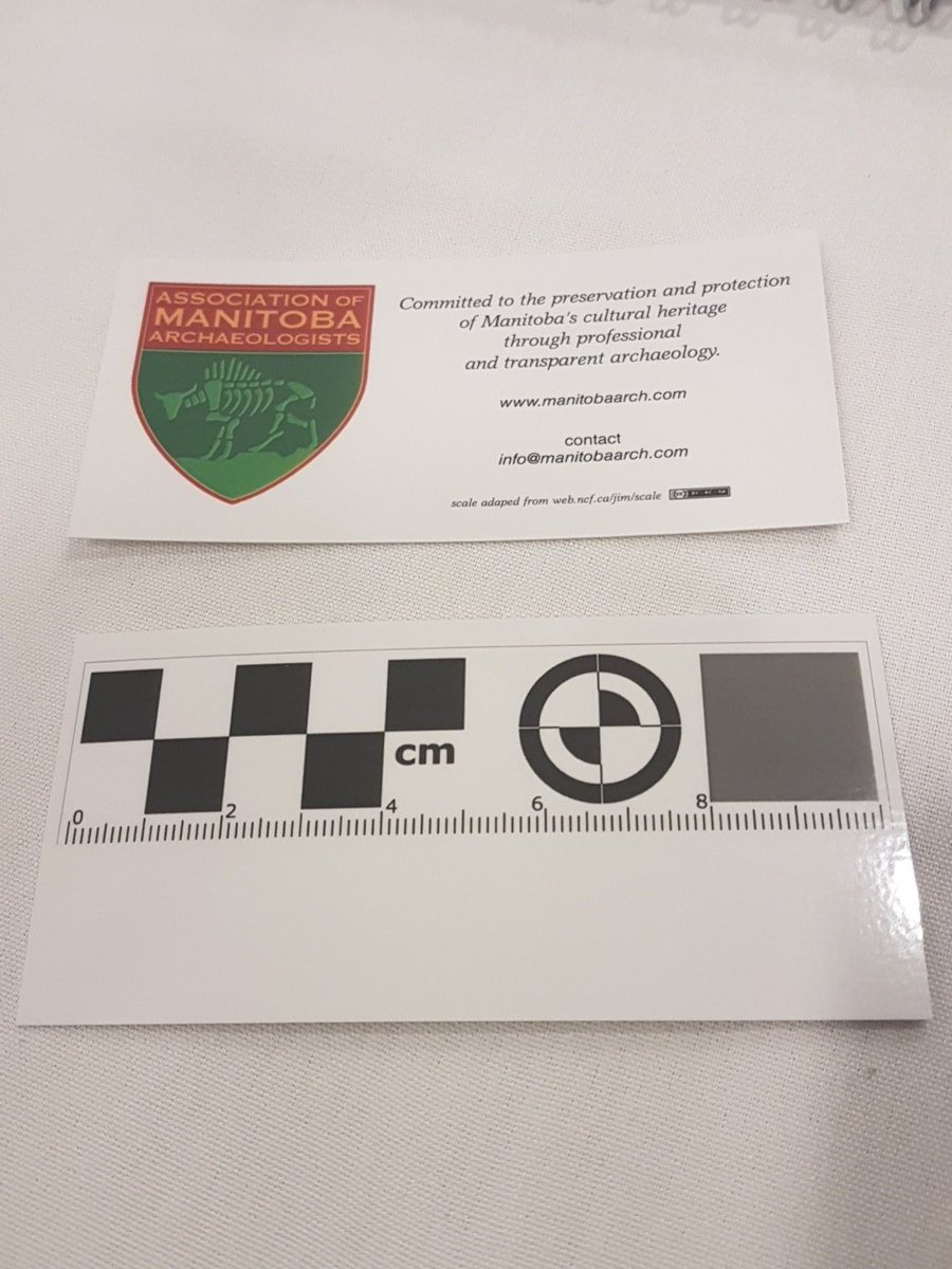 MBarchaeo's tweet photo. We're set up at the @can_arch Conference! Come visit us for information about what we do, and to pick up a handy field scale or T-shirt, and free candy! #CAA2018ACA https://t.co/o2nwnEBHWo
