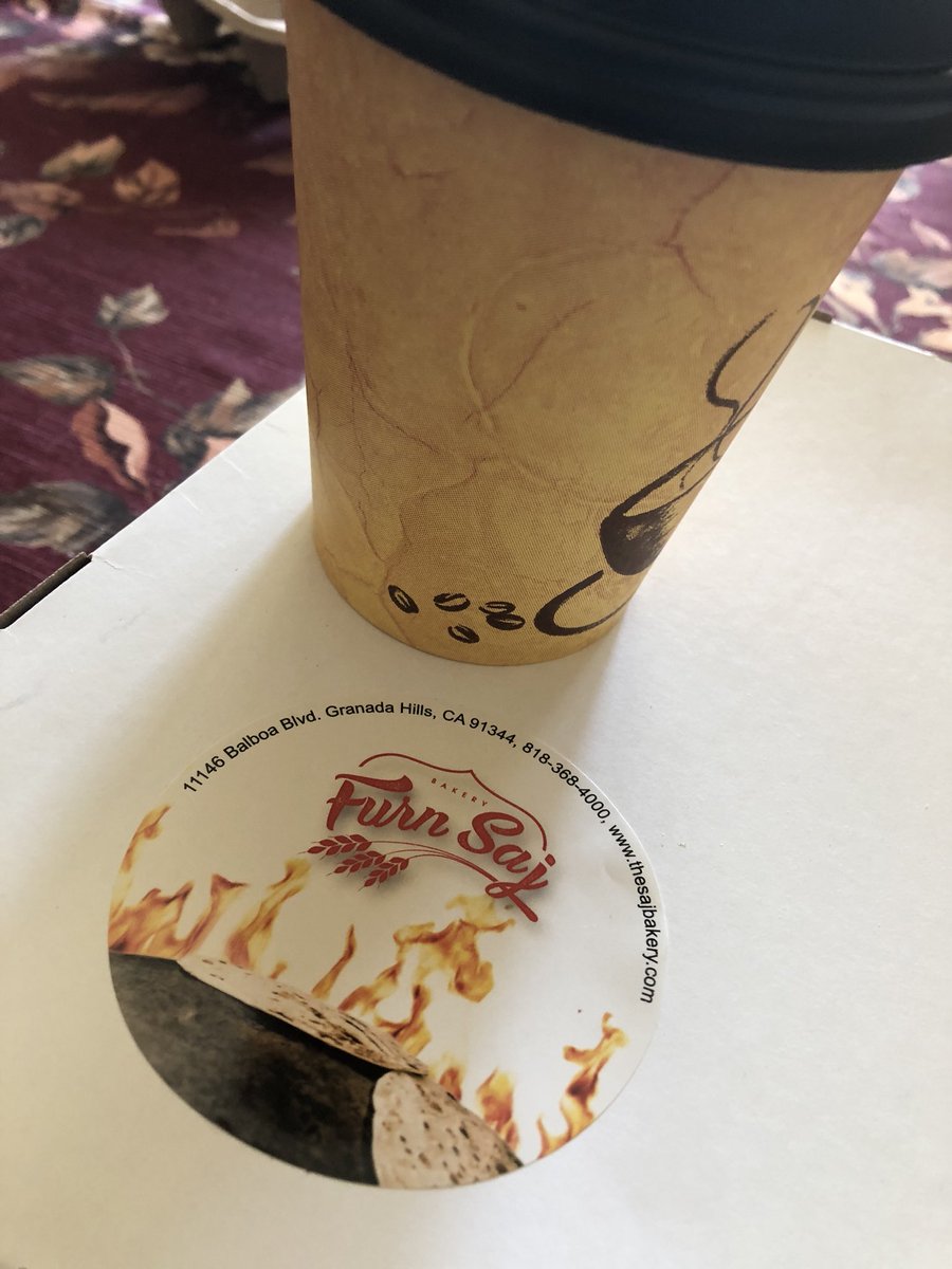 Ajarski for breakfast. Dip pieces of crust into egg yolk. From Saj Bakery in Granada Hills (closer and safer  than Beirut).