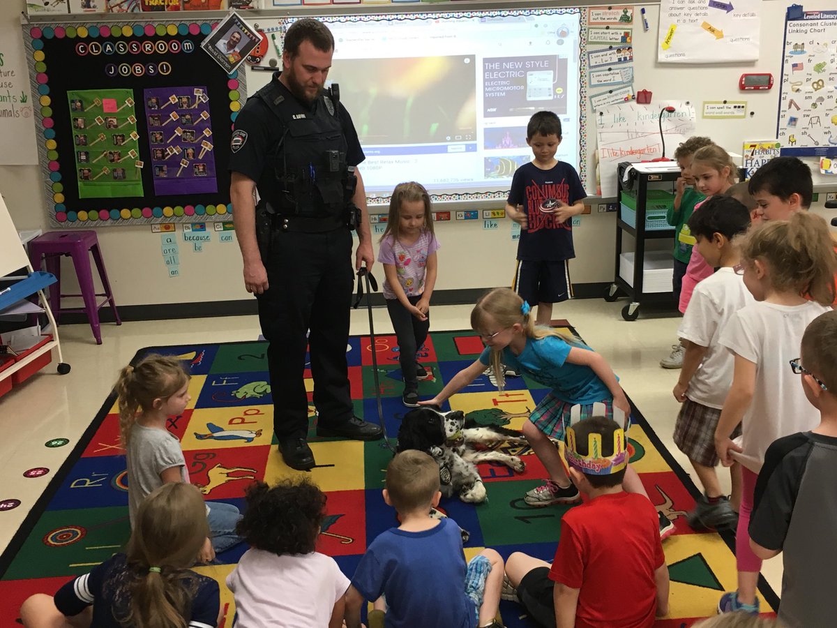 Students welcome “stash” the police dog to kindergarten