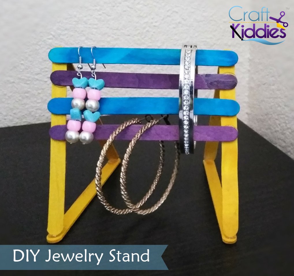 Great Mother's Day Gift Idea:  DIY Popsicle Stick Jewelry Stand #mothersday #kidcrafts #craftkiddies craftkiddies.com/2018/05/diy-po…