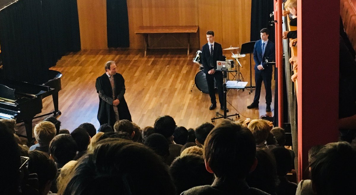 RadleyJSocial's tweet photo. Tom Sweetnam and Archie Barrow deliver their Kit4Kenya appeal to a full assembly at Summer Fields this am - thank you @SFSOxford @RadleyCollege #Kit4Kenya https://t.co/fN0IBi5skl