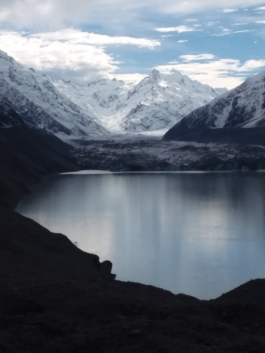 NateHaut's tweet photo. A neat view of a glacier and mountains in New Zealand.  So far the views of this trip are pretty spectacular. https://t.co/dkKO9c5RIS