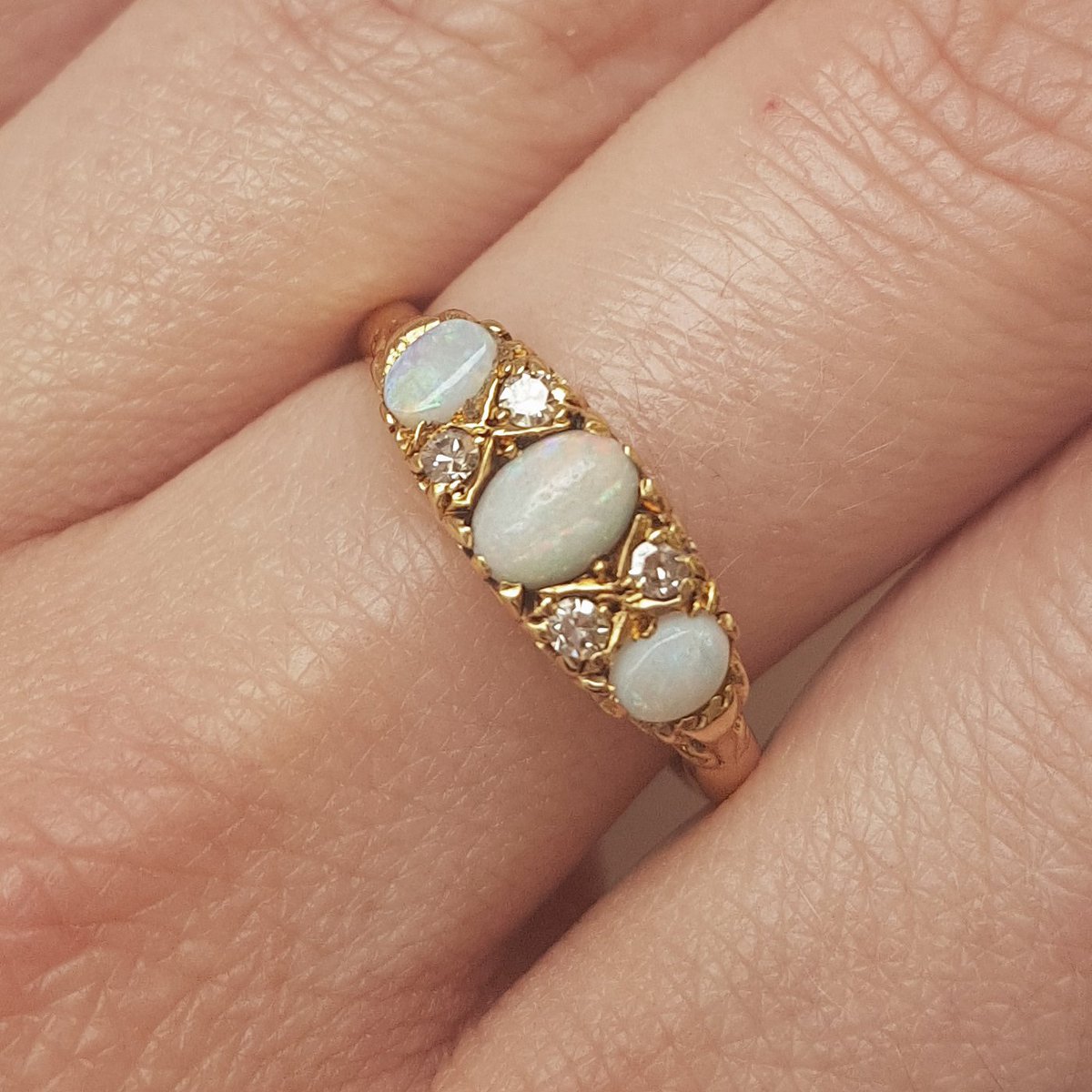 See how this #antique 18ct gold, diamond and #opal ornate ring glistens! View this beautiful piece in our #Harrogate showroom &amp; online now: goo.gl/gLxxt6