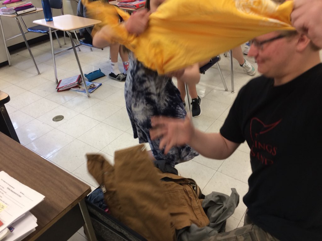 SenorBunker's tweet photo. How do you break up the doldrums of a long testing week?  Have one-on-one races to the suitcase to see who can find the correct clothing item to practice our new vocabulary!  @Kings_Schools https://t.co/sDKbXnidJR