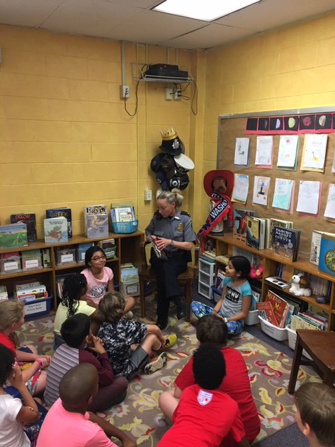 AlexandriaVAPD's tweet image. Today Lt. T. May was at Douglas MacArthur Elementary School reading "Skippyjon Jones" to 3rd grade students. #HappyFriday #CommunityPolicing