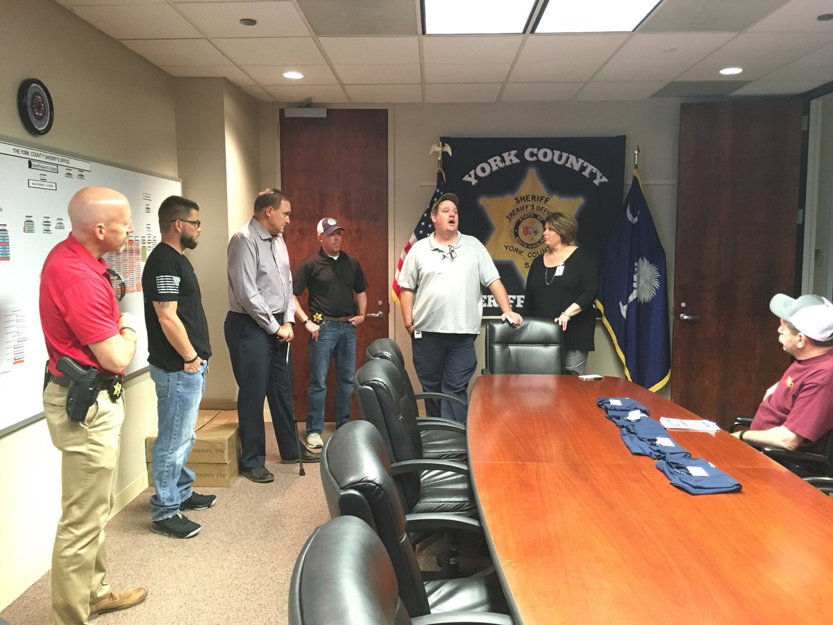 YCSO_SC's tweet photo. Nathan Peters & Christa Bolin came by today to drop off the money for our wounded officers raised at the BBQ fundraiser at Trinity Methodist Church in York back in April. Sgts. Brown, Clinton, Doty & Cummings @YorkSCPD were on hand. #YCSOFamily #YCSOStrong #NeverForget809 https://t.co/7SPKriDiZB