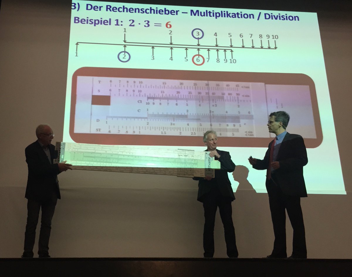 modellansatz's tweet photo. Prof Dr Ralph Pollandt demonstriert bei der #LaNaMa die #Mathematik des Rechenschiebers im Großformat. https://t.co/QWVQPEFXf7