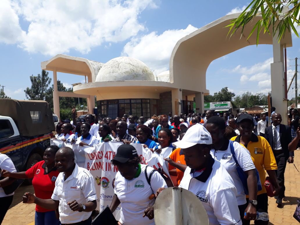 EdnaTallam's tweet photo. 8km symbolic walk from Bungoma hospital to @KibabiiUni to mark the launch of International #NursesWeek joined by @BungomaCountyKe Deputy Governor, @nnakenya Chair & Nurses #IDM18 #VoicetoLead #NursesweeKe #IND2018 @MOH_Kenya https://t.co/CrooMmXpMd