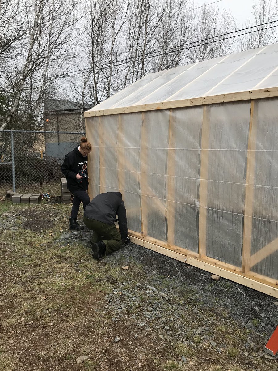 Students were finishing up work on the greenhouse today. Soon ready to start planting! #experientiallearning