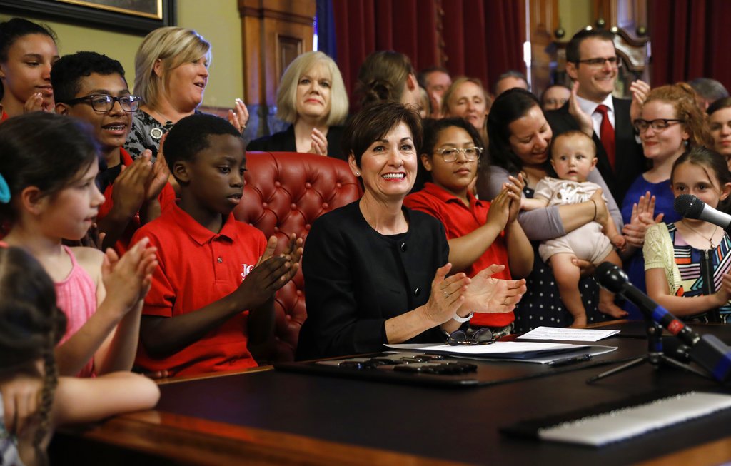 Image result for U.S.: Governor Reynolds signs law banning abortion at 6wks